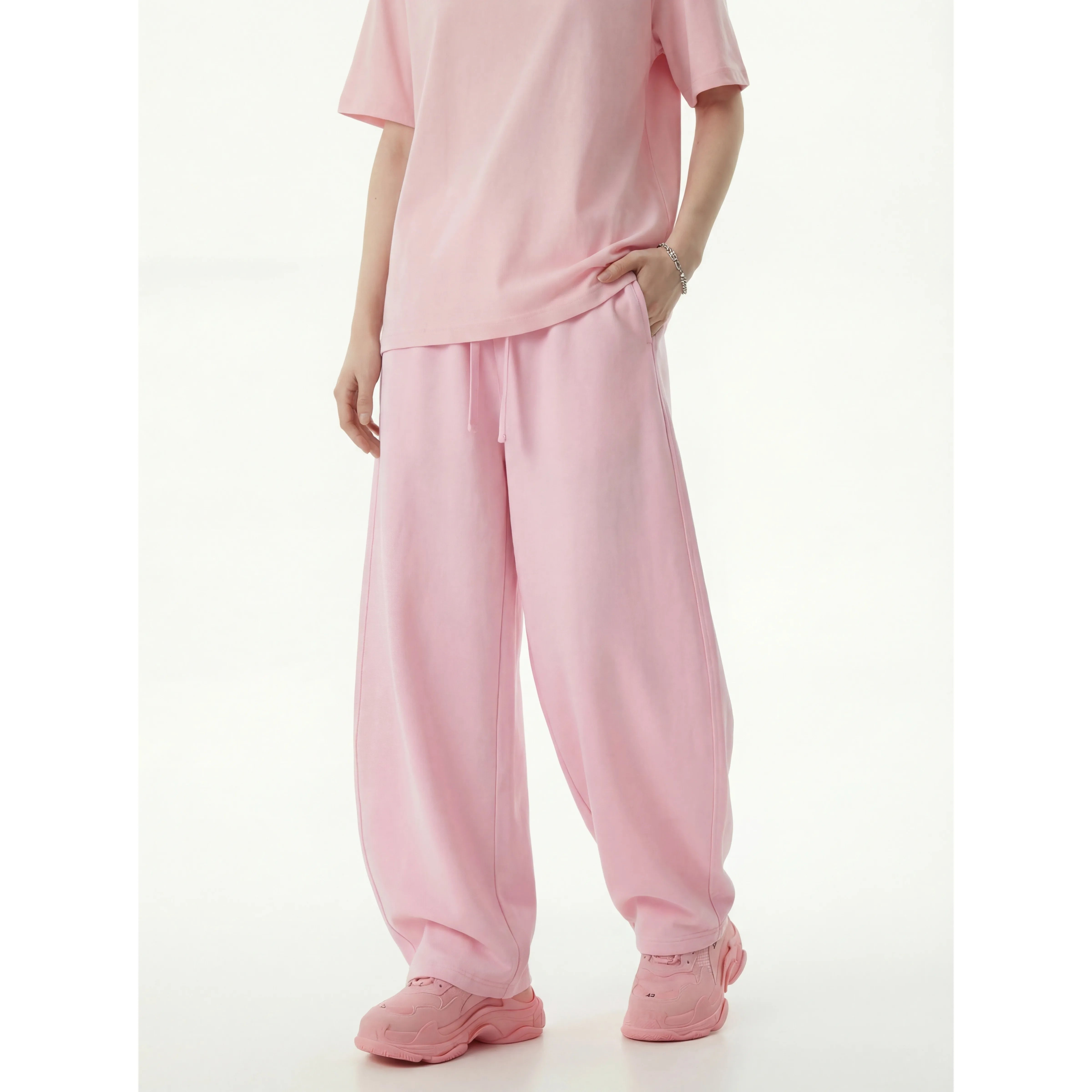 Kanye stretchy distressed washed curved-leg pants