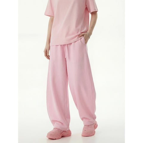 Kanye stretchy distressed washed curved-leg pants