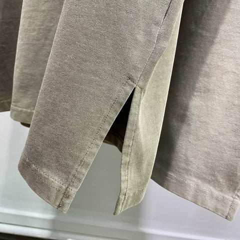 Kanye West's washed-out distressed tank top