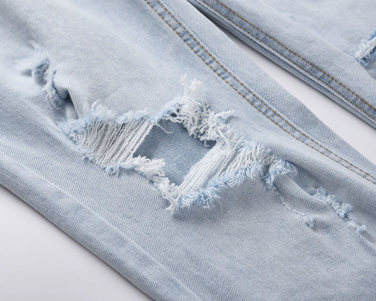 Kanye's identical street hip-hop distressed jeans