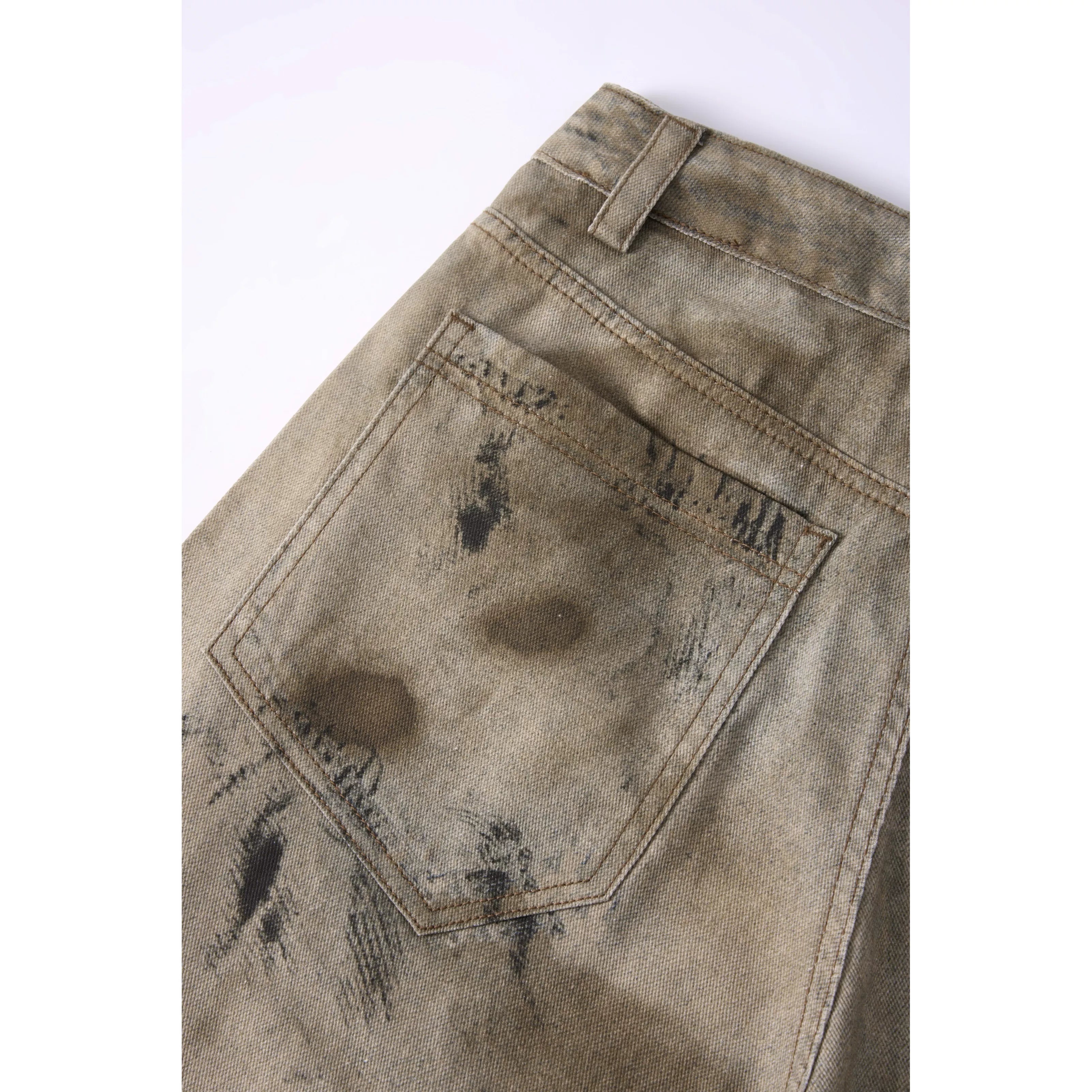 KANYE's washed and distressed denim pants
