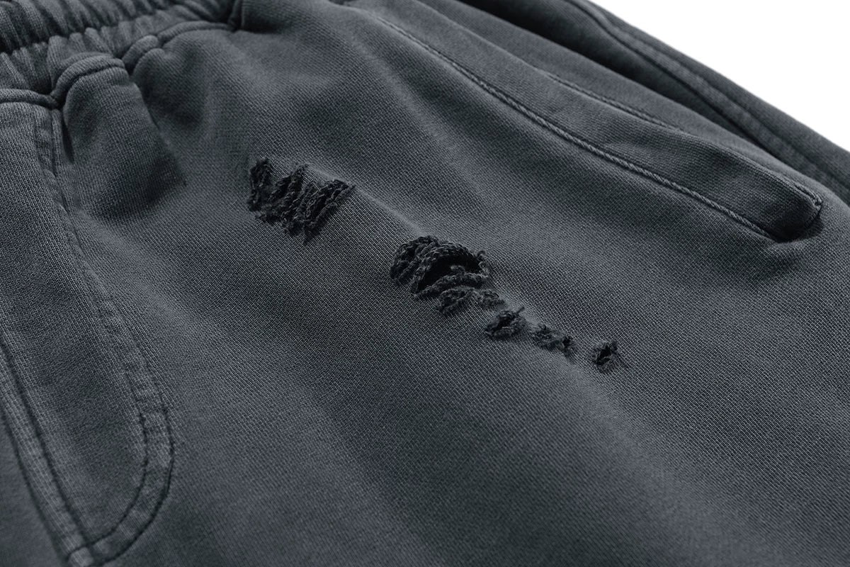KANYE's high-end washed and distressed denim shorts
