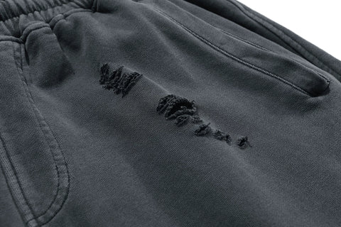 KANYE's high-end washed and distressed denim shorts
