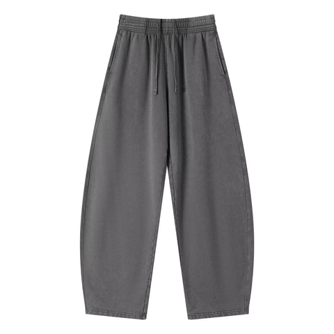Kanye stretchy distressed washed curved-leg pants