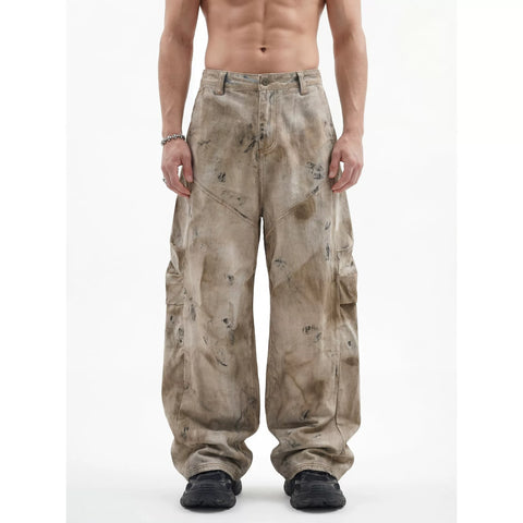 KANYE's washed and distressed denim pants