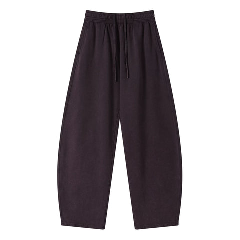 Kanye stretchy distressed washed curved-leg pants
