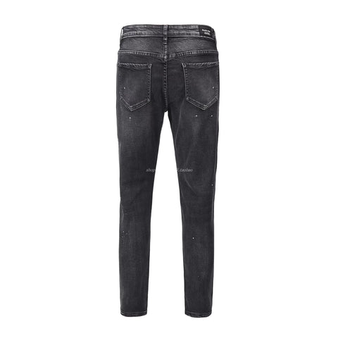 KANYE's distressed ink-print stretch denim pants