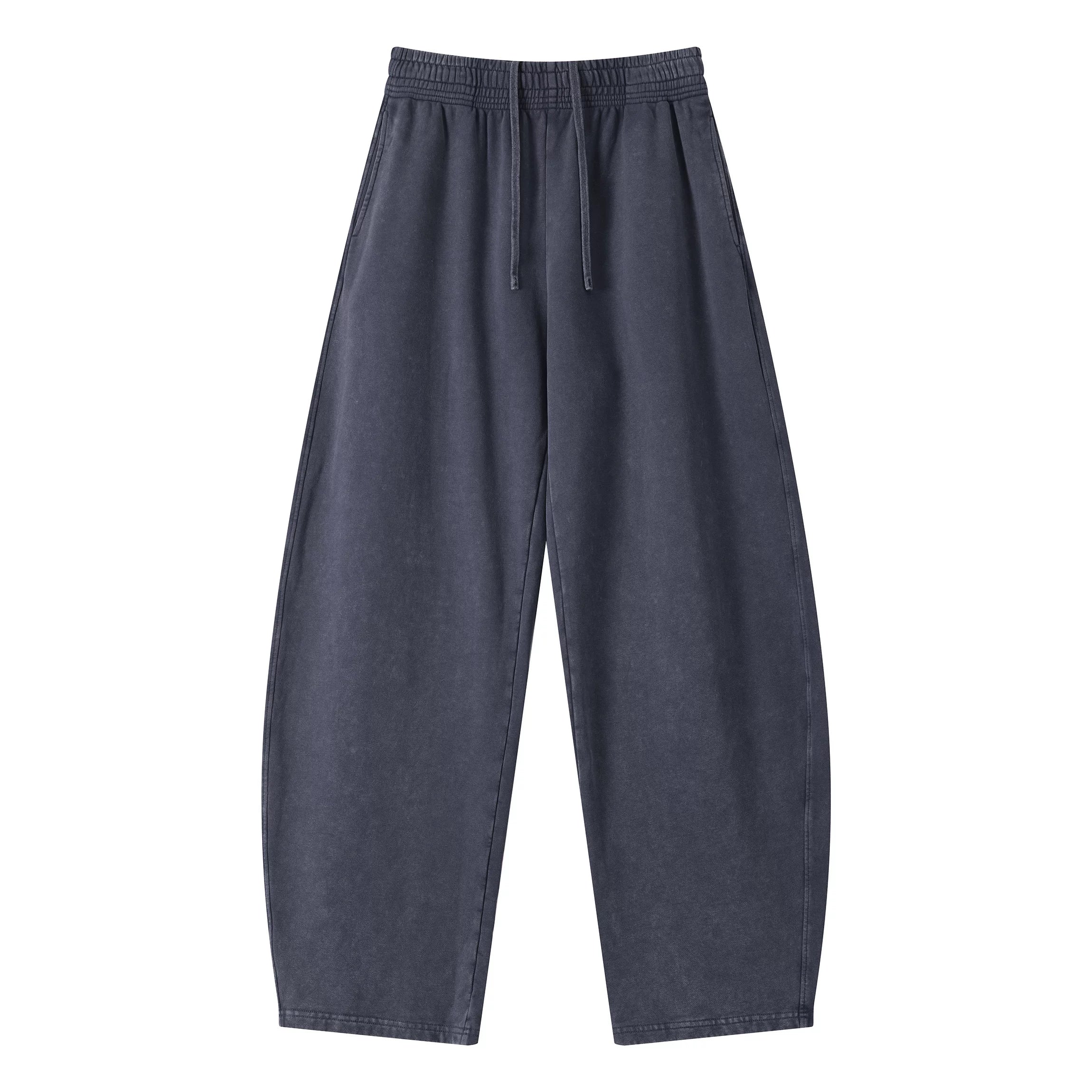 Kanye stretchy distressed washed curved-leg pants
