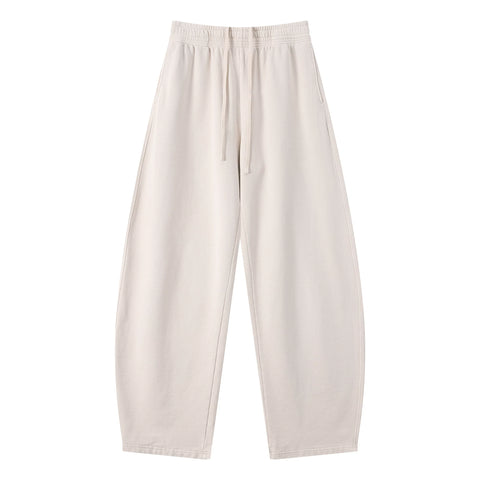 Kanye stretchy distressed washed curved-leg pants
