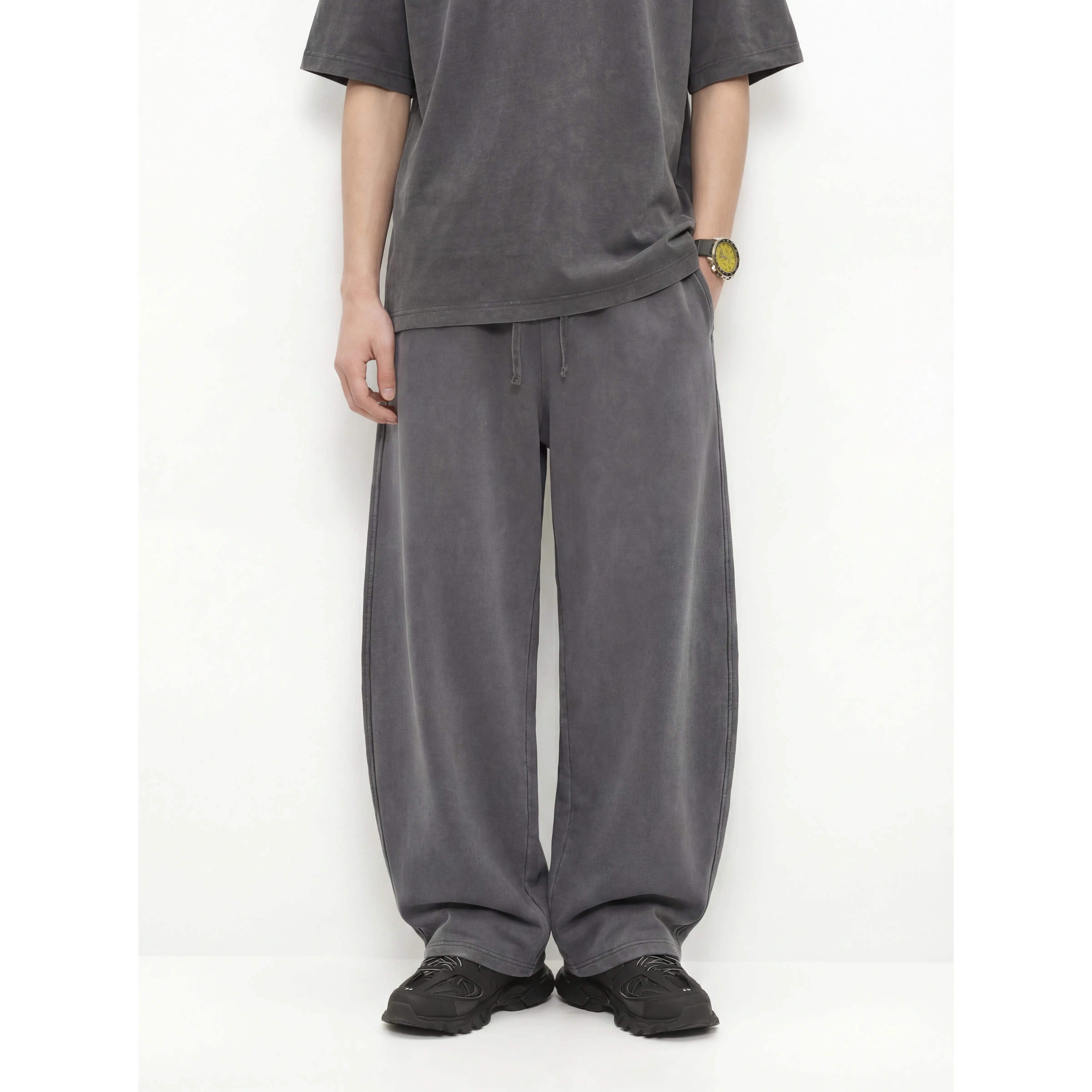 Kanye stretchy distressed washed curved-leg pants