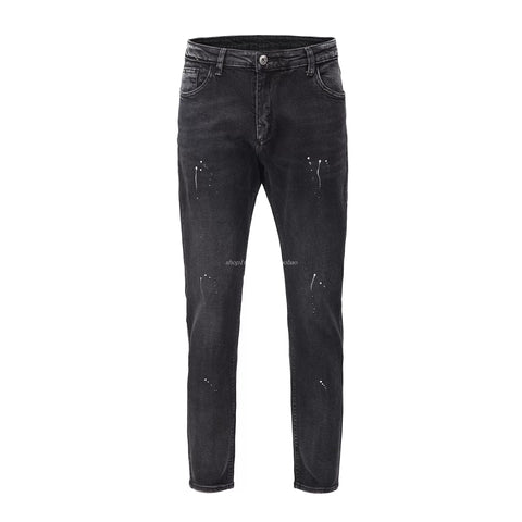 KANYE's distressed ink-print stretch denim pants