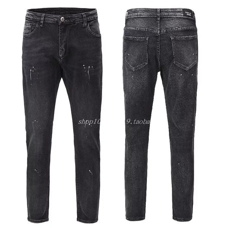 KANYE's distressed ink-print stretch denim pants