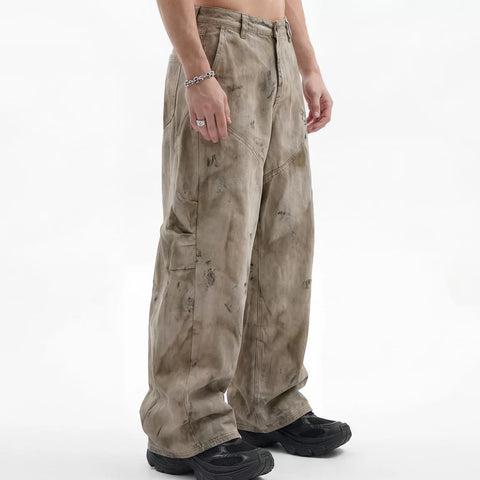 KANYE's washed and distressed denim pants